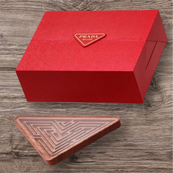 Prada Maze -New Year of the Dragon2024 -ball rolling within traces out a dragon